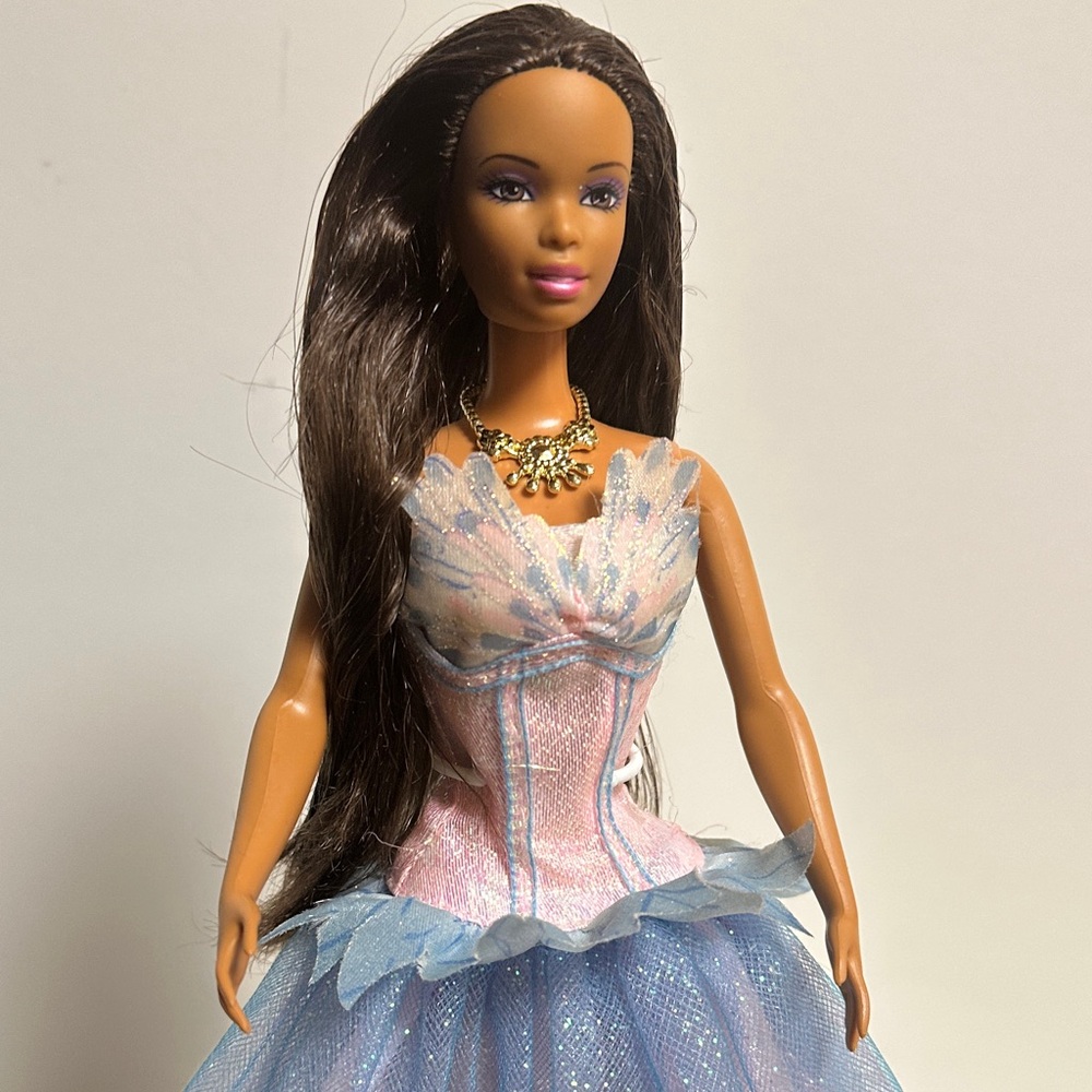 Mattel Barbie Doll with Pink and Blue Dress. Pre-Owned in Excellent Condition!